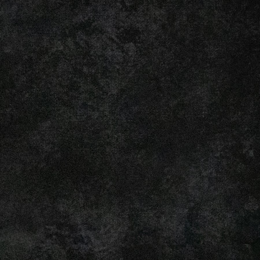 A close square of the Studio Smoke backdrop: hand-painted charcoal canvas, mottled with soft grey light.